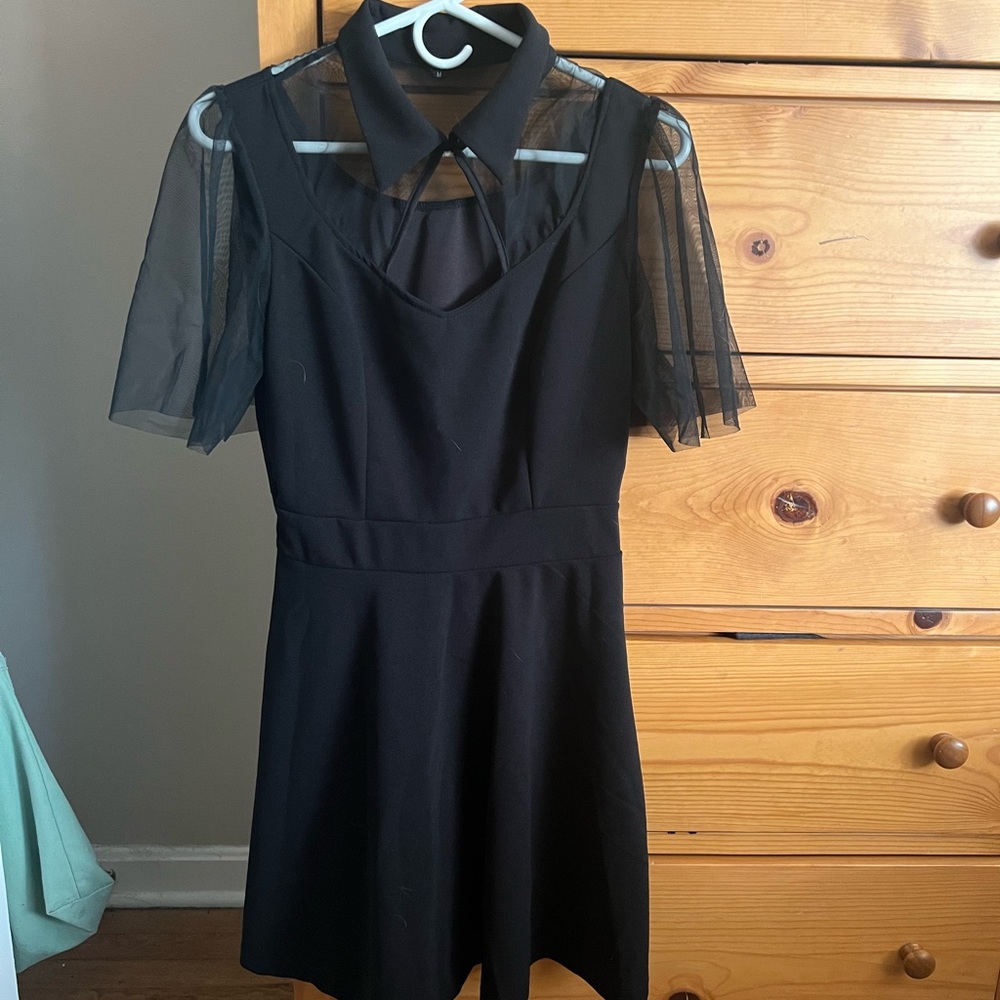 Black dress with collar and mesh sleeves